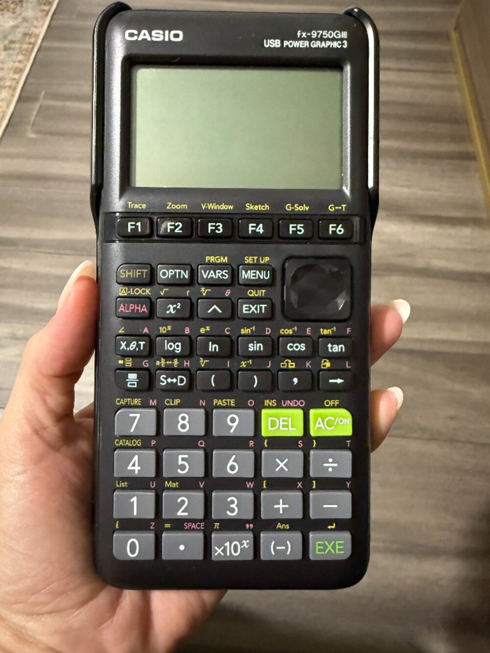 The Casio fx-9750GIII graphing calculator (Never Used)